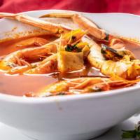 7 Mares · Mixed seafood soup, carrots, potatoes.