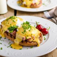 California Eggs Benedict · Avocado and Canadian bacon on English Muffin with two poached eggs and Hollandaise sauce.