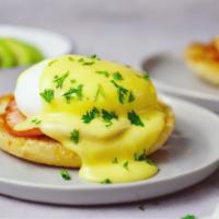 Country Benedict · Hash browns, sausage patty, poached eggs, and hollandaise sauce.