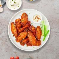 Classic Crunch Wings · Fresh chicken wings fried until golden brown. Served with a side of ranch or bleu cheese.