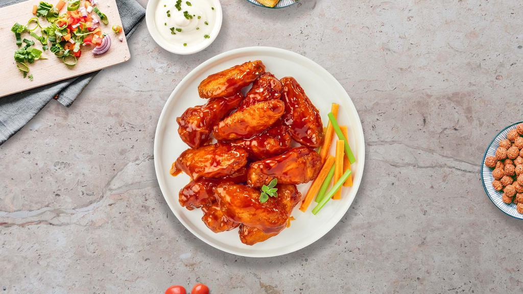 Follow The Buffalo Wings  · Fresh chicken wings fried until golden brown, and tossed in buffalo sauce. Served with a side of ranch or bleu cheese.
