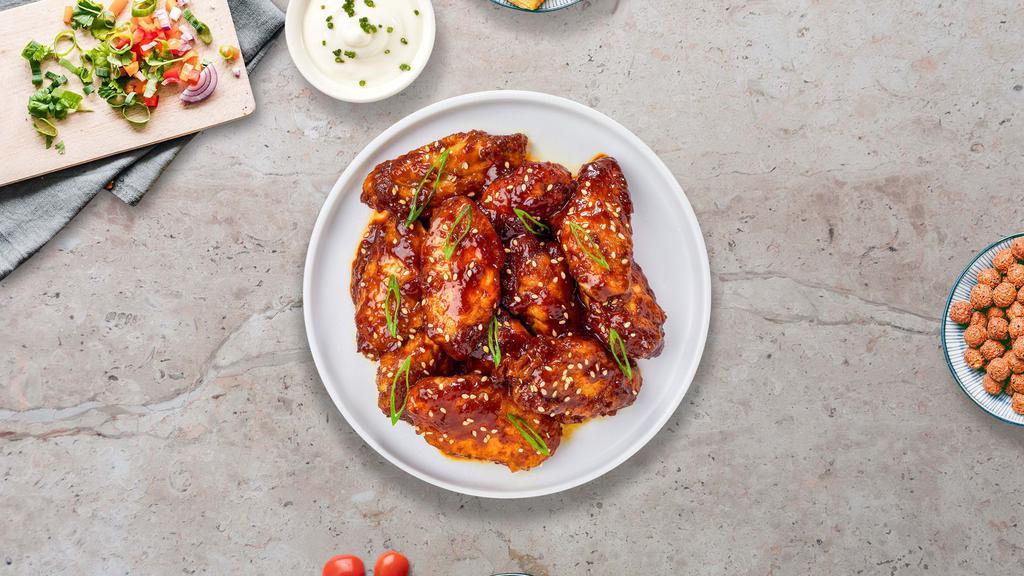 Teriyaki Kick Wings · Fresh chicken wings fried until golden brown, and tossed in teriyaki sauce. Served with a side of ranch or bleu cheese.