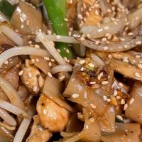 Sesame Noodles · Stir fried flat rice noodles with ground peanut, bean sprout, onion, and sesame.