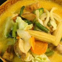 Yellow Curry · Yellow curry paste in coconut milk with potato, onion, baby corn, and carrot. No rice.