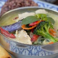 Green Curry · Green curry paste in coconut milk with green bean, eggplant, broccoli, bell pepper, and swee...