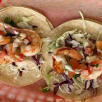 Shrimp Tacos Combo · 2 Sautée shrimp tacos topped with cabbage, tomato, cilantro, and onions. Choice of beans. To...