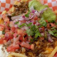 Birria Loaded Fries · French fries topped with beef Birria, jack cheese, cheddar cheese, sour cream, guacamole and...