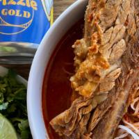 PhoBirria with short rib · Pho noodles topped with our Birria and a short rib. Served with sprouts, mint leaves, lime, ...