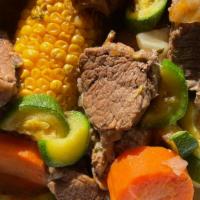 Caldo de Res - Beef stewed · Beef stewed with potatoes, carrots, corn and cabbage. Choice of tortillas or bread