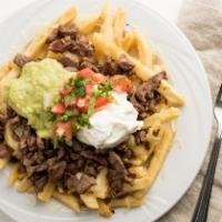 Carne Asada Fries · French fries topped with grilled Carne Asada, jack cheese & cheddar cheese, Pico de gallo, g...