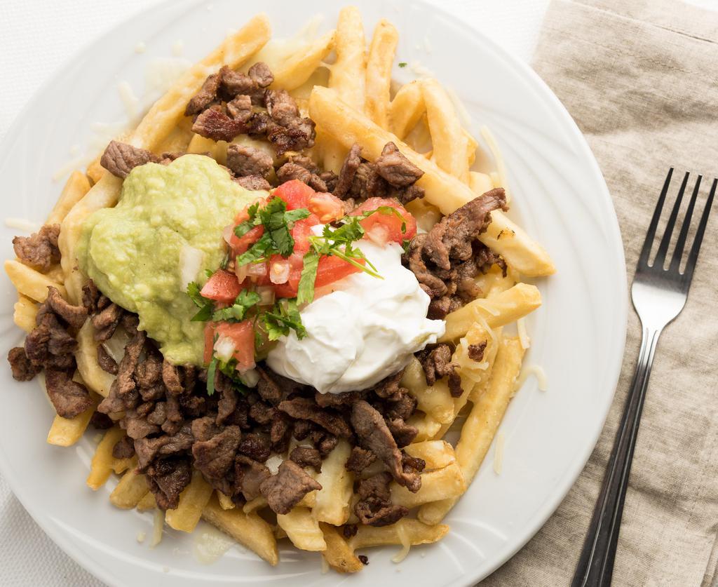 Carne Asada Fries · French fries topped with Carne Asada, Jack and cheddar cheese. Pico de gallo, sour cream and guacamole.