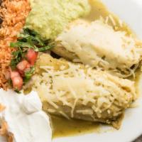 Tamales - Combo · Choice of two tamale. Choice of beans. Serve with tomato rice, sour cream, lettuce, and guac...