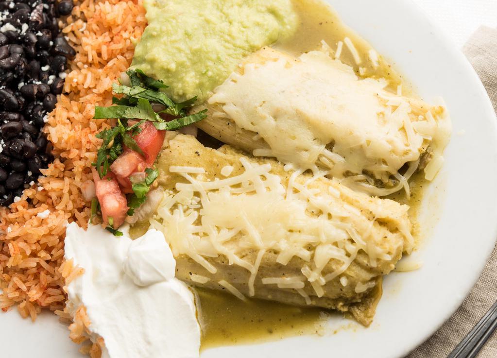 Tamales - Combo · Choice of two tamale. Choice of beans. Serve with tomato rice, sour cream, lettuce, and guacamole.