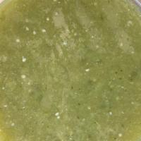 Salsa verde - Medium heat · Tomatillos, chile serranos, onions, and garlic.