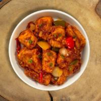 Paneer Chili Pleaser · Marinated cubes of cottage cheese, bell peppers, onions & tomatoes marinated in an Indian Ch...