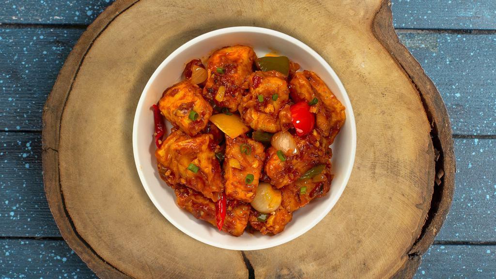 Paneer Chili Pleaser · Marinated cubes of cottage cheese, bell peppers, onions & tomatoes marinated in an Indian Chilli sauce