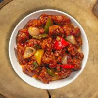 Beat By Gobi Manchurian · Cauliflower pieces dipped in corn batter and fried with soy sauce, tomatoes, chilies and gar...