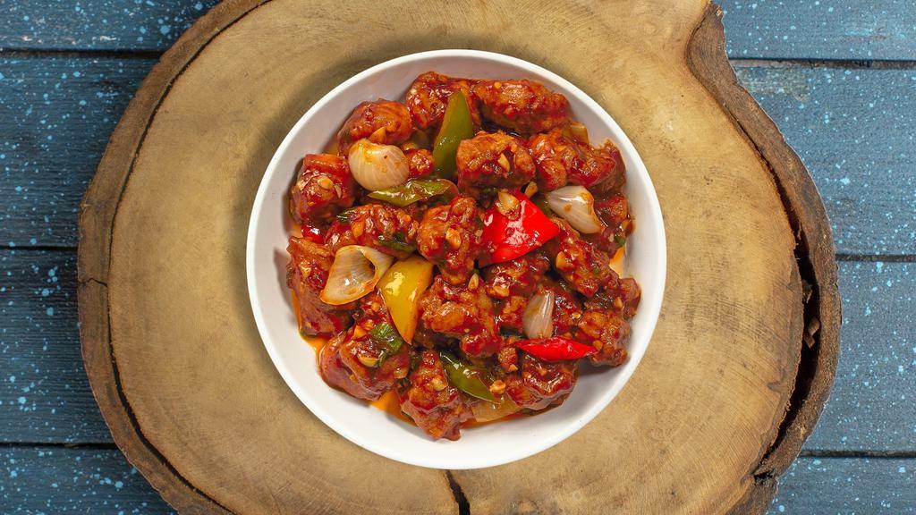 Beat By Gobi Manchurian · Cauliflower pieces dipped in corn batter and fried with soy sauce, tomatoes, chilies and garlic