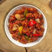 Beat By Veggie Manchurian · Cauliflower pieces dipped in corn batter and fried with soy sauce, tomatoes, chilies and gar...