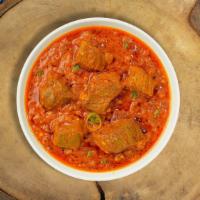 Goat Pepper Masala · Goat cooked in a creamy tomato gravy and freshly ground spices