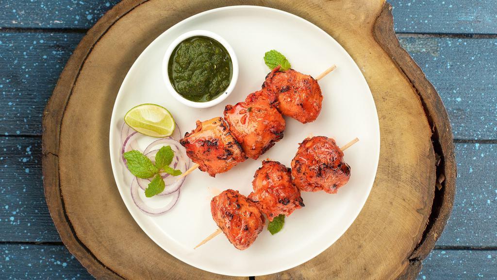 Hariyali Chicken Tikka Kebab Keeper · Boneless pieces of our chicken cubes marinated in a yoghurt and baked in a tandoor clay oven
