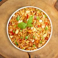 Chicken Fried Rice · Indo-Chinese fried rice cooked with chicken, egg, vegetables, soya sauce, chili sauce and ch...