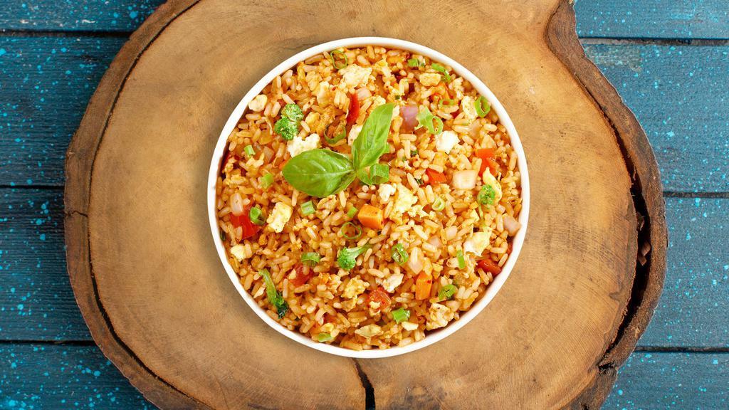Veggie Fried Rice · Indo-Chinese fried rice made of long grain rice, mix vegetables, salt and pepper.