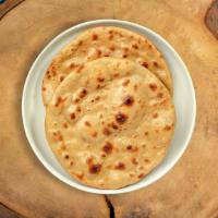 Tandoori Roti Ringer · Whole wheat Indian bread cooked in a clay oven.