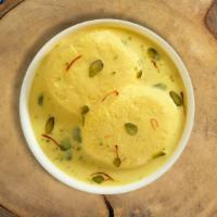 Rasmalai Runner · Soft cottage cheese balls served in chilled creamy milk