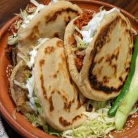 Gorditas · Corn masa dough cakes with
an open center ready to be
filled with your choice of meat.