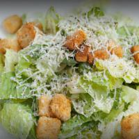 Caesar Salad · Romaine Lettuce, Croutons, Freshly Grated Parmesan Cheese and Caesar Dressing