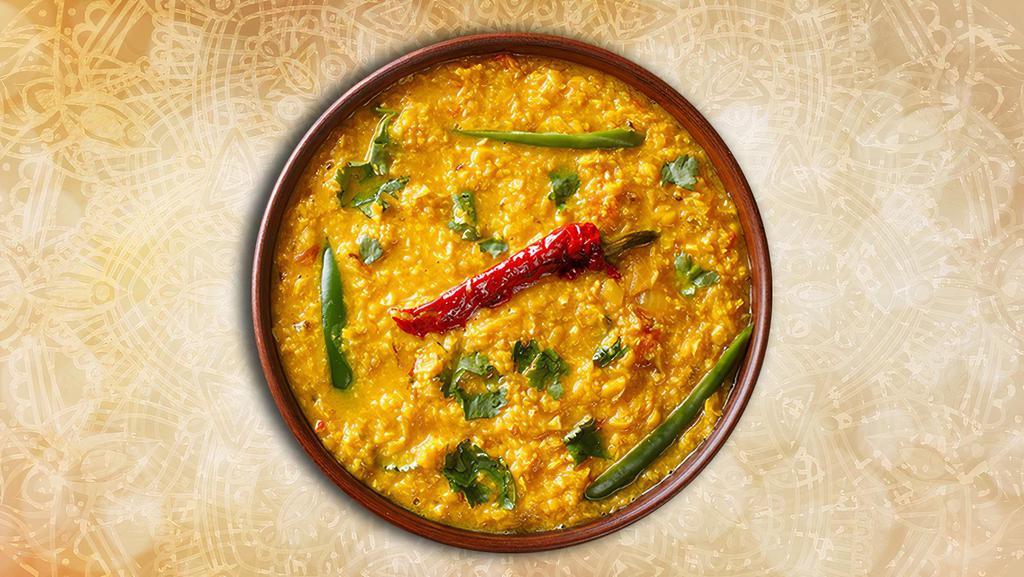 Yellow Dal Tadka · Yellow lentils cooked to perfection in a slow flame and tempered with spices