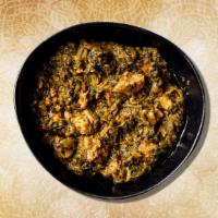 Spinach & Lamb Curry  · Tender chunks of marinated boneless lamb, slow cooked in a thick onion, ginger, garlic and s...