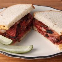 The Purist · *now with 20% more meat!* choice of pastrami, corned beef or smoked turkey, served on our ow...