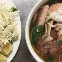 Bún Bò Huế · Spicy Beef and Pork Noodle Soup.