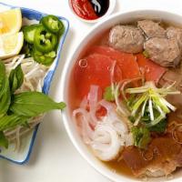 Đặc Biệt Bò Viên · Thin sliced steak, brisket, flank, tendon, tripe & beef balls w/rice noodle.