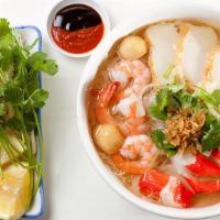 Phở Hải Sản · Rice noodle soup w/shrimp, squid, fish cake & imitation crabmeat.