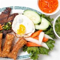 Cơm Sườn, Hột Gà, Tàu Hủ Ky · Grilled pork chop, sunny side up egg & fried shrimp cake w/steamed rice.