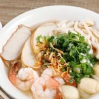 7. House Special Noodle Soup · Combination rice noodle soup. Serve dry or wet. Thick wide rice noodle soup with shrimp, fis...