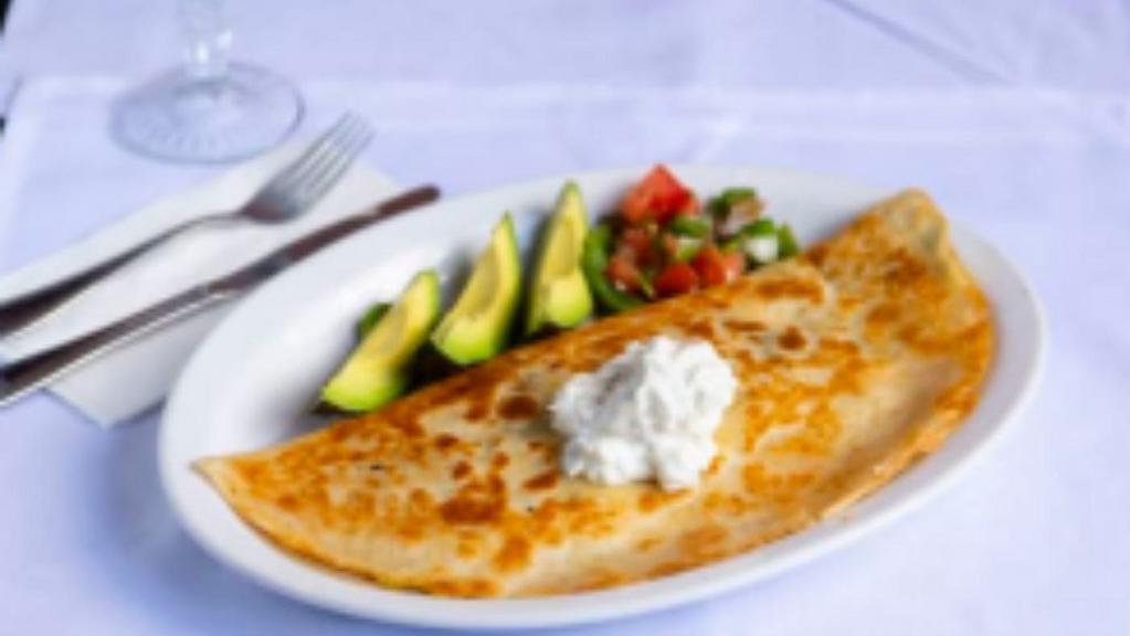 Spinach & Egg Quesadillas · with avocado & queso especial, eggs and spinach