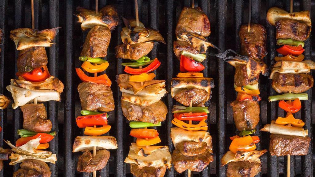 Grilled Meats for 2-3 · Grilled lamb chops, 2 skewers of Persian kubideh kebabs, hummus grilled sumac chicken, basmati rice, fire roasted veggies .