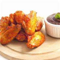 Classic Plain Wings · Fresh batch of crispy chicken wings, served with a side of ranch.
