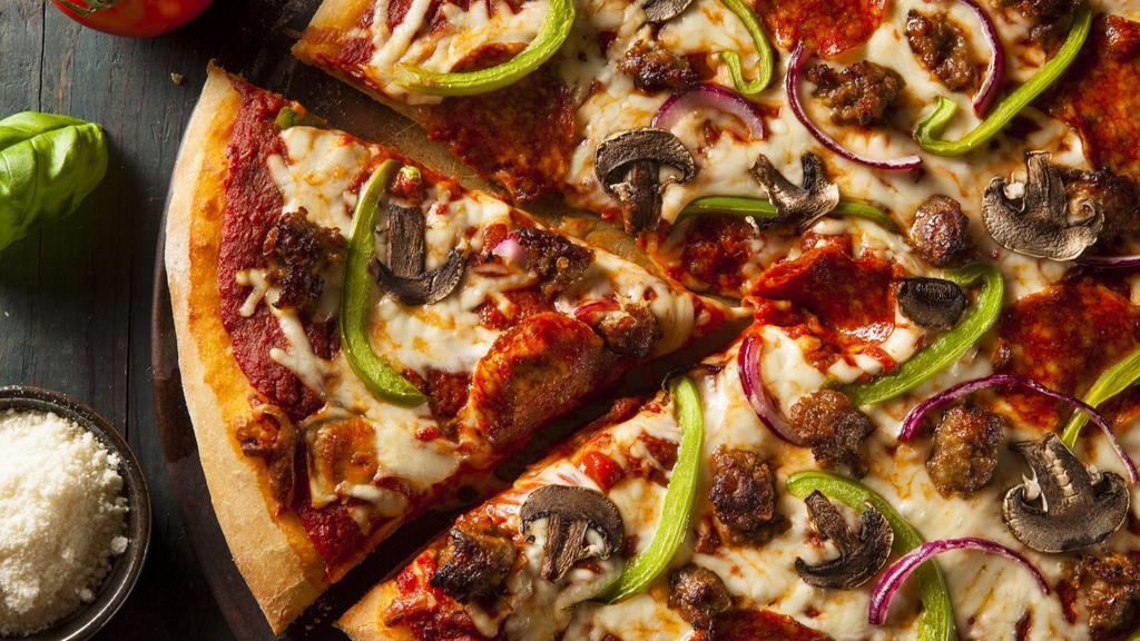 Warrior Lovers Pizza · Fresh-warm warriors pizza made with house made red sauce, pepperoni, sweet red onions, green bell peppers, fresh cut mushrooms, roma tomatoes, and freshly cut Italian garlic sausage.
