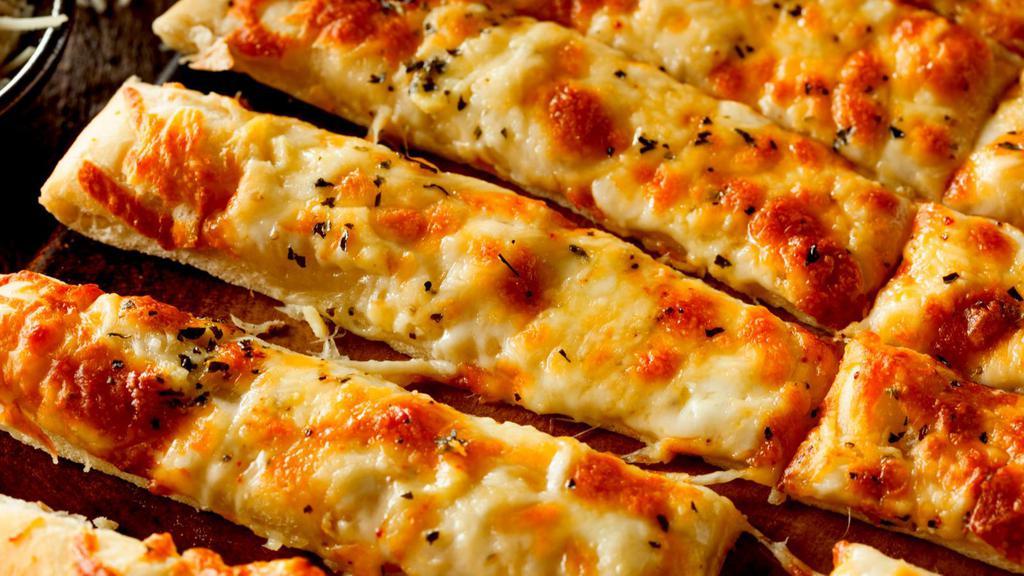 Garlic Cheese Sticks · Warm and cruncy garlic cheese sticks made with cheese topped on warm garlic sticks.