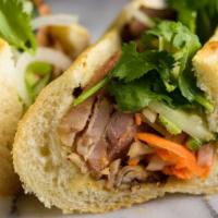 #4 Grilled Chicken Banh Mi · Vietnamese Marinated Chicken, House Mayonnaise Spread, Soy Sauce,  Pickled shredded Daikon a...