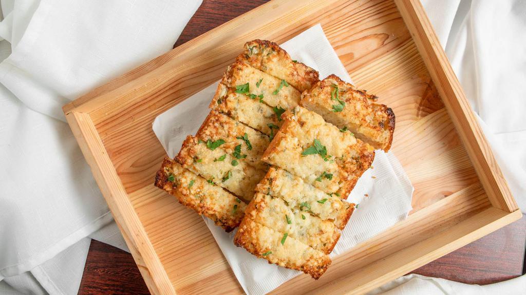 Garlic Bread · Homemade bread, garlic, parmigiano, parsley.