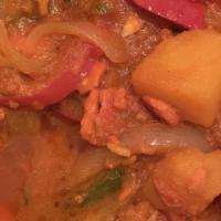 Lamb Vindaloo · Lamb curry and potatoes in a very hot curry sauce.