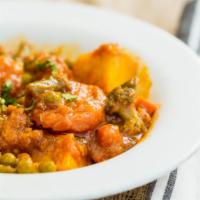 Mixed Vegetables · Mixed vegetables cooked with spices in a traditional curry.