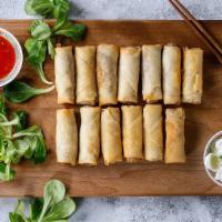 Spring Roll · A crunchy and savory roll filled with cabbage, carrots, and other fresh veggies.