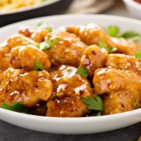 Orange Chicken · Crunchy chicken, fried to perfection, and drizzling with our special tangy orange sauce.